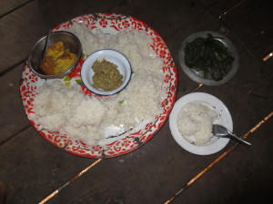 ShePaw's Mother cooks our food. Today we have eggs, noodles and greens. This is way more than usual. We must be careful and eat just a little without offending them, because, remember we are also invited to eat with NawJe and her family