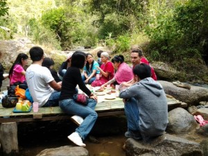 On the "dock" in the stream, with our new Thai friends.