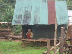There is an old lady in the village of NeLeeGwee, who lives in this little tin house all by herself.