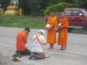 The Buddhist people of Thailand worship all the monks - young and old.
