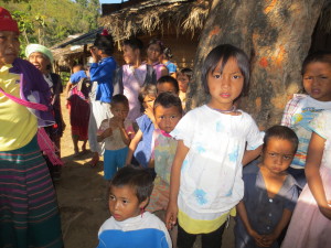 As usual the whole village comes out to watch and wonder.
